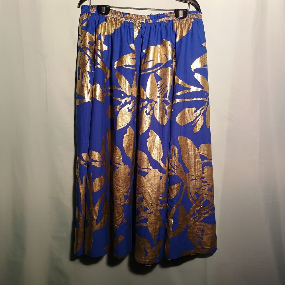 Two sides Skirt, Royal blue and Gold on one side Black and Gold on the other.
